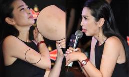 Lý Băng Băng liên tục liếm micro, lộ vết cắn khó hiểu ở cánh tay