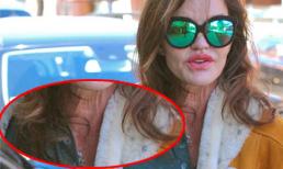 'Thảm họa thẩm mỹ' lộ cổ nhăn nhúm, mặt chảy xệ ra phố