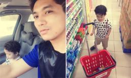 Tim lặng lẽ đưa con trai đi mua sắm đầu năm