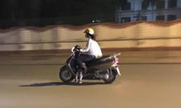 Sốc với hình ảnh mẹ vắt con dưới chân ga phi nhanh trên phố