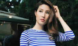 Diễm My 9x để tóc lệch vai dịu dàng xuống phố