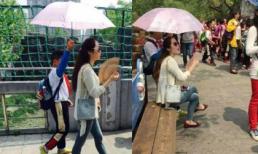 Cô giáo sợ nắng, bắt học sinh che ô như vệ sĩ