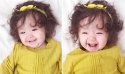 Cadie hớn hở khoe răng sữa cùng nụ cười thiên thần