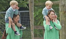 Hoàng tử George đáng yêu công kênh trên vai bà