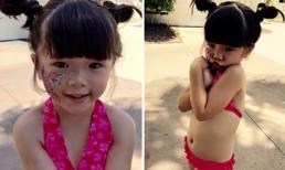 Con gái Thúy Nga diện áo tắm khoe bụng tròn xoe