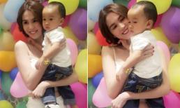 Ngọc Trinh xinh tươi trong ngày thôi nôi cháu