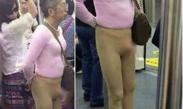 Người đàn ông mặc phản cảm dửng dưng đi tàu điện ngầm