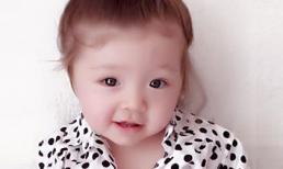 Cadie ra dáng như người lớn với sơ mi chấm bi 