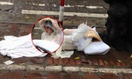 'Thiên thần gãy cánh' nằm dưới trời mưa khiến cộng đồng mạng xôn xao