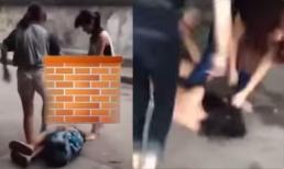 Nữ sinh cấp 2 bị đánh hội đồng, lột áo tàn nhẫn