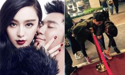 Lý Thần cúi gập người buộc dây giày cho Phạm Băng Băng