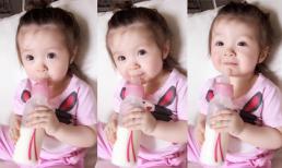 Cadie tập uống sữa một mình không cần mẹ Elly giúp