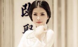 Hoa hậu Phạm Hương đẹp nền nã trong tà áo dài