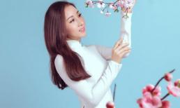 Á hậu điện ảnh Xuân Quỳnh khoe sắc rạng rỡ với áo dài Minh Châu