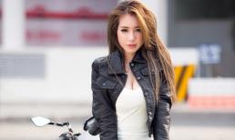 Elly Trần khoe dáng đồng hồ cát bên xe mô-tô phân khối lớn