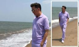 Đàm Vĩnh Hưng diện 'cây tím' lang thang trên bãi biển
