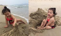 Con gái Jennifer Phạm mặc bikini thích thú chơi đùa với cát biển