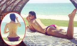 Phạm Hương táo bạo 'quên' mặc áo bikini khi tắm nắng trên biển