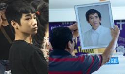Con nuôi Minh Thuận đứng lặng người trong đám tang cha nuôi
