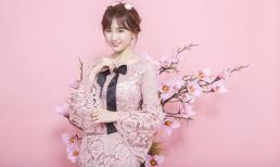 Hari Won trẻ trung diện áo dài ren đón Xuân