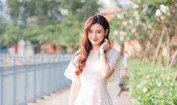 Midu diện đầm trắng xinh đẹp dạo phố