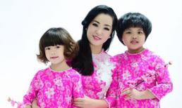 Ba mẹ con Thúy Nga duyên dáng khi diện áo dài