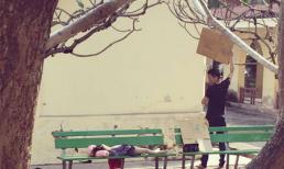 Cảnh người cha che chở con gái nhỏ trong sân bệnh viện lay động triệu trái tim