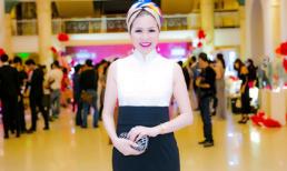 Hoa hậu Bùi Thị Hà diện trang phục độc đáo trao cúp 'Bông hồng quyền lực'