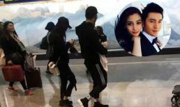 Huỳnh Hiểu Minh bế con trai cùng bà xã Angela Baby trở về từ Mỹ 