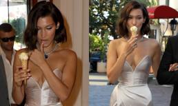 Hết lộ nội y, siêu mẫu Bella Hadid lại vừa đi vừa liếm kem tại LHP Cannes