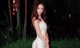 Ca sĩ Vi Nhạn Ngọc 'đốt' ánh nhìn bằng đường cong trong dạ hội trắng tinh khôi