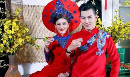 Lâm Khánh Chi và ông xã diện áo dài đỏ rực chuẩn bị đón Tết