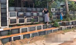 Hàng rào siêu độc đáo làm từ tivi cũ ở Việt Nam được lên báo nước ngoài 