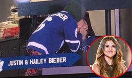 Justin Bieber hôn vợ đắm đuối ở sân bóng nhưng lại trên nền nhạc xập xình của Selena Gomez