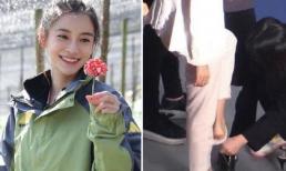 Angelababy gây tranh cãi khi để trợ lý cúi rạp xuống đất để thay giày, cởi tất 