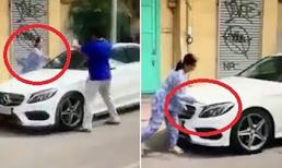 Công an đã mời người phụ nữ dùng búa đập xe Mercedes vì 'rọi đèn vào nhà là mang xui xẻo' lên trụ sở