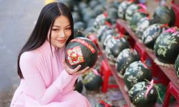 Hoa hậu Trái đất Phương Khánh thu hút mọi ánh nhìn khi diện áo dài thướt tha đi chợ hoa Tết