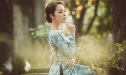 Dương Cẩm Lynh e ấp trong tà áo dài du Xuân