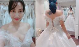 'Mẹ 3 con' Ốc Thanh Vân vòng một trễ nải, lộ hình xăm khủng khi thử váy cưới