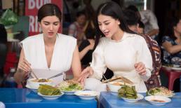 Phương Khánh duyên dáng với áo dài trắng, đưa Á hậu Miss Earth 2018 khám phá TP.HCM