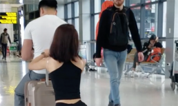 Cặp đôi hồn nhiên squat, tập gym ngay tại sân bay Nội Bài gây tranh cãi