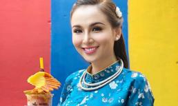 Hoa hậu Diễm Hương diện áo dài lộng lẫy nhưng gương mặt khác lạ mới là tâm điểm