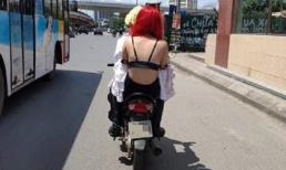 Nóng mắt với cô gái mặc áo lót đi xe máy giữa thời tiết hơn 40 độ C tại Hà Nội