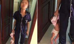 Mẹ trẻ xăm trổ túm cổ áo, xách ngược con mới sinh lủng lẳng trên tay khiến dân mạng phẫn nộ