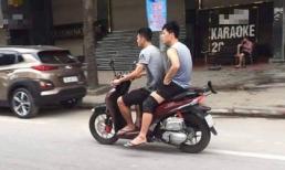 Hình ảnh cầu thủ Đình Trọng - Văn Kiên đi xe máy không đội mũ bảo hiểm khiến dân mạng tranh cãi nảy lửa