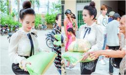 Mặc dân mạng ném đá, Trần Đoàn vẫn rạng rỡ đội nắng bê từng bao gạo phát cho người nghèo