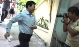 Ông Nguyễn Hữu Linh chạy thật nhanh vào phiên tòa xử dâm ô