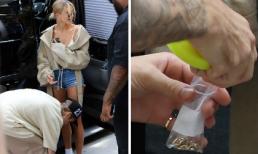 Vợ đánh rơi vàng trên phố, Justin Bieber chẳng ngại cúi gập người nhặt đồ 