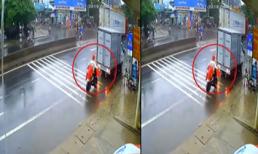  Thấy ôtô tải đang lùi, cô gái đi xe đạp điện vẫn cố thủ thi gan với tài xế