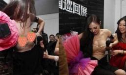 Dương Mịch đi sự kiện bị fan kéo tụt váy, phản ứng của cô khiến nhiều người chú ý